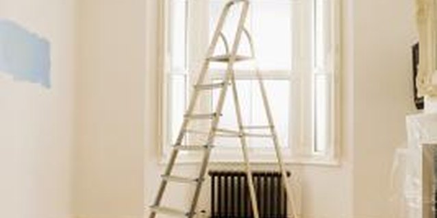 Jupiterimages/Pixland/Getty Images Tapered edges are a design engineered into drywall panels.