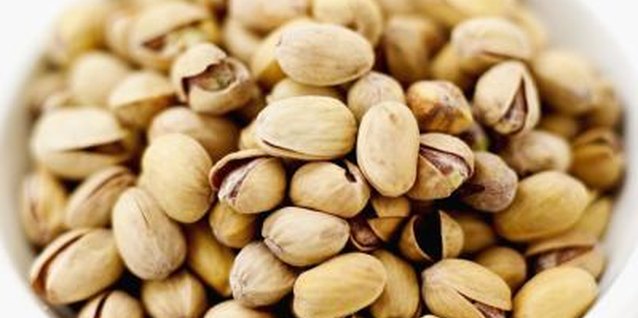 Stockbyte/Stockbyte/Getty Images Pistachios contain more copper per serving than peanuts.