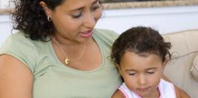 Creatas Images/Creatas/Getty Images Parents can build stronger attachments with their children by learning from the available research.
