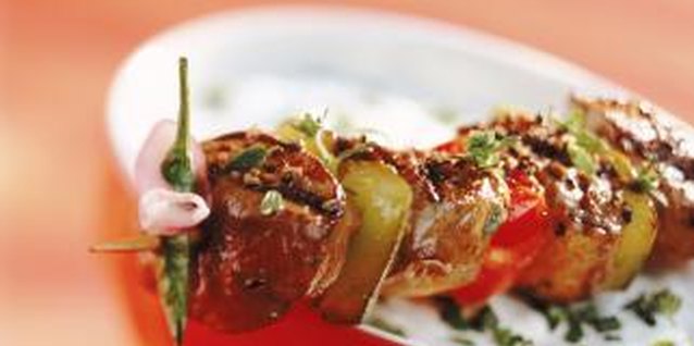 John Foxx/Stockbyte/Getty Images Foods grill best on the hibachi when they're cut in small pieces.