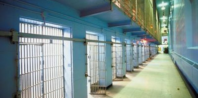 Jupiterimages/Photos.com/Getty Images A husband in jail make many aspects of life difficult.