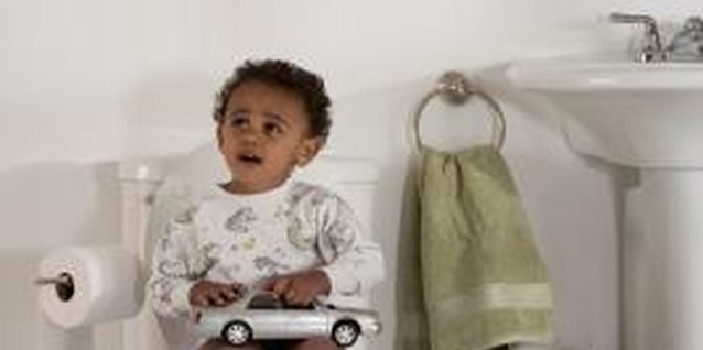 Comstock Images/Comstock/Getty Images Irritable bowels don't necessarily complicate potty training.