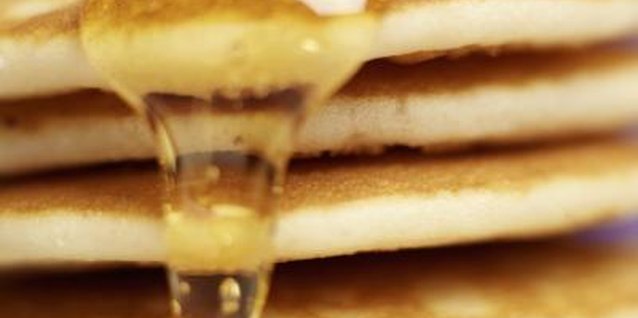 Ciaran Griffin/Stockbyte/Getty Images Fluffy, golden brown pancakes are a tasty start to the day.