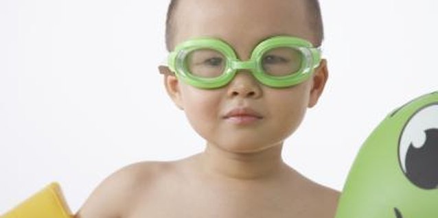Sean Justice/Stockbyte/Getty Images Pick goggles that your child likes wearing.