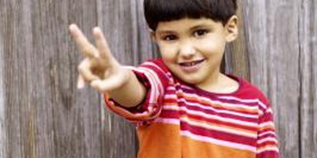 Creatas/Creatas/Getty Images Even little kids can dig peace and love.