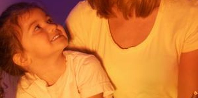 Jupiterimages/liquidlibrary/Getty Images Hugs will help your little one feel loved and accepted.