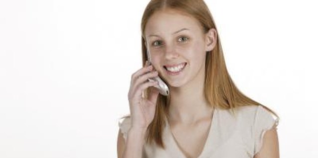 Comstock Images/Comstock/Getty Images Removing phone privileges may work for preteens who are social butterflies.