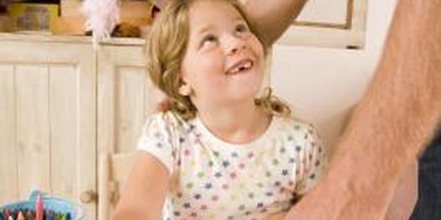 Jupiterimages/Polka Dot/Getty Images Pick out the best curriculum for your child.