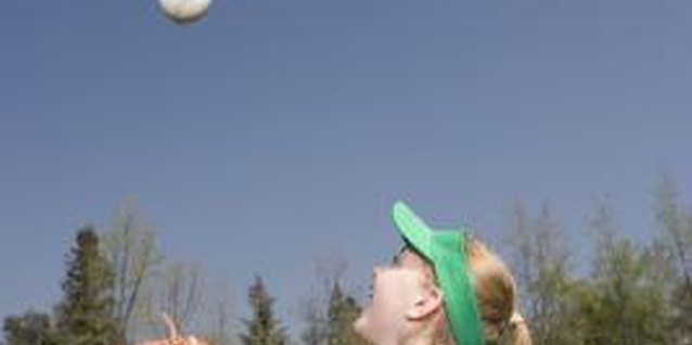 Jupiterimages/Brand X Pictures/Getty Images Strengthening your throwing arm can boost the speed and power of your throws.
