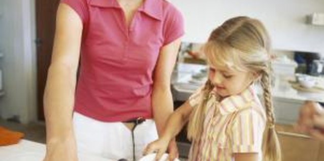 George Doyle/Stockbyte/Getty Images Chores you assign your child must be age-appropriate.