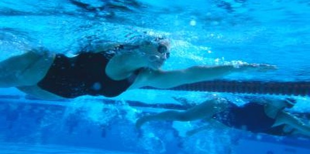 George Doyle/Stockbyte/Getty Images Swimming burns the most calories at a low-intensity level.