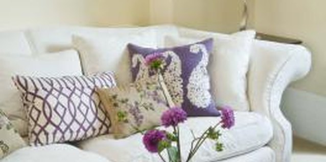 Jupiterimages/Polka Dot/Getty Images Cushions add decorative accents to the decor.