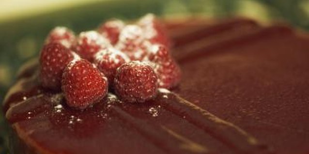 Jupiterimages/Stockbyte/Getty Images Use the cream to make a luxurious ganache for a cake.