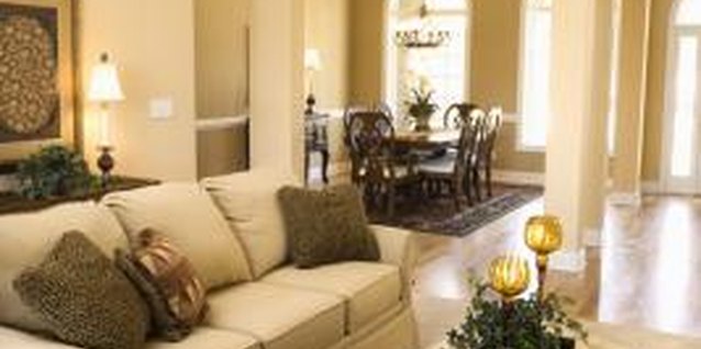 Jupiterimages/Comstock/Getty Images Mix and match leg and arm designs on sofas to add visual appeal.