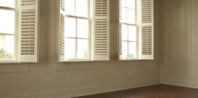 Comstock Images/Comstock/Getty Images Preparing a new construction wall for painting requires patience and skill.