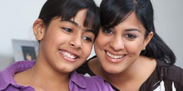 Visage/Stockbyte/Getty Images A daughter may prefer her mother over her father because she can relate to her more than she can her father.