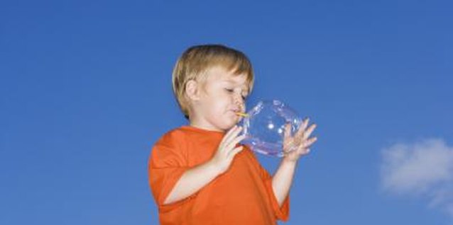 Polka Dot Images/Polka Dot/Getty Images Blow bubbles using straws or loops of string.