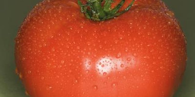 Thinkstock/Comstock/Getty Images Irregular irrigation can lead to cracked fruit.