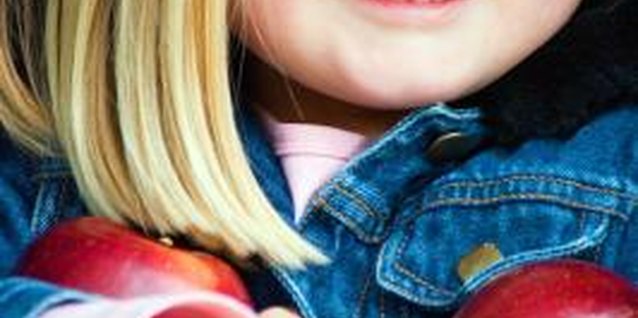 Jupiterimages/Photos.com/Getty Images Get creative with fruit to encourage your kiddo's interest in healthy treats.