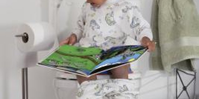 Comstock Images/Comstock/Getty Images Potty training can have its funny moments, too.