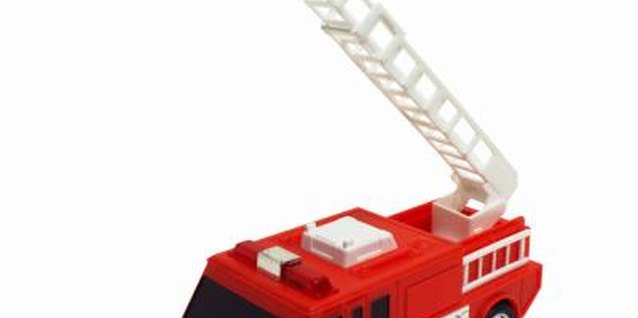 George Doyle/Stockbyte/Getty Images Spark your preschooler's imagination with toy fire trucks.