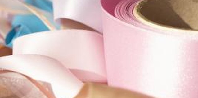 Maria Teijeiro/Photodisc/Getty Images Transform plain, flat ribbon into decorative pleated embellishments.