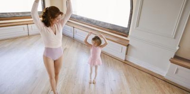 Jupiterimages/Creatas/Getty Images Exercising with your preschooler not only sets a good example, it is so much fun!