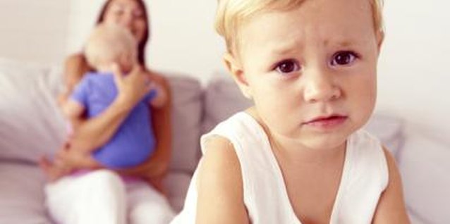 Pixland/Pixland/Getty Images It takes times for a tot to learn to share the limelight.