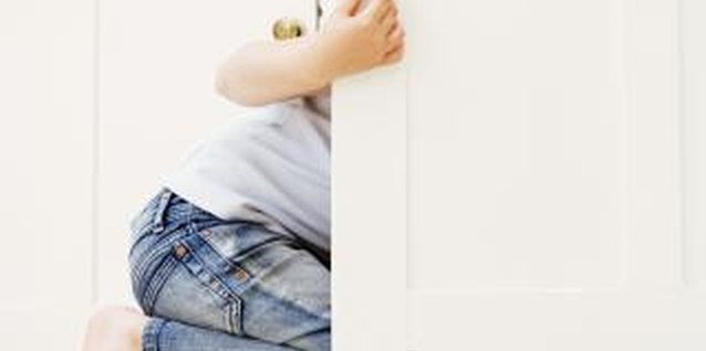 Digital Vision./Photodisc/Getty Images The draw is strong, but kids should stay out of many cabinets.