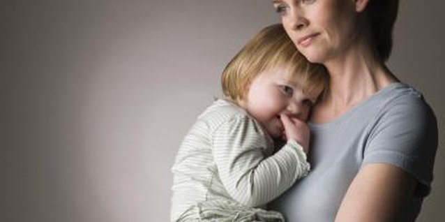 Jupiterimages/Polka Dot/Getty Images Your toddler will need lots of comfort to deal with parental abandonment.