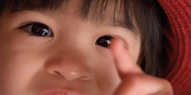 Liquidlibrary/liquidlibrary/Getty Images Pointing is a fine motor skill useful for communication.