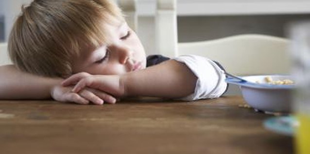 BananaStock/BananaStock/Getty Images Scheduled nap time benefits preschoolers in many ways.