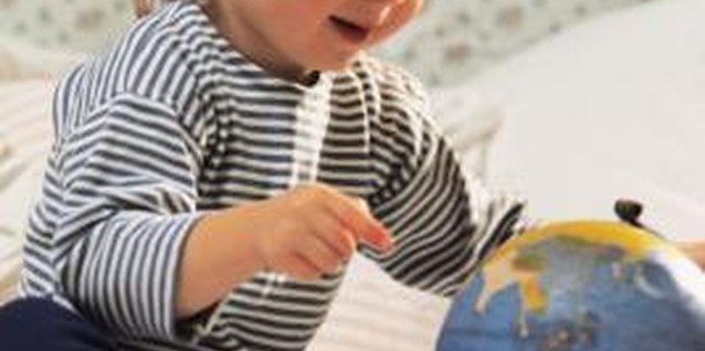 Comstock/Comstock/Getty Images A child may need to learn two languages to communicate with everyone in a multicultural family.