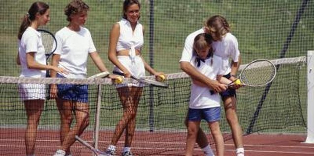 David De Lossy/Photodisc/Getty Images Teens in Baton Rouge can participate in day camps, including several tennis camps.