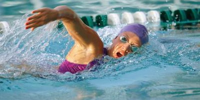 Stockbyte/Stockbyte/Getty Images Press your "buoy" to improve your freestyle.