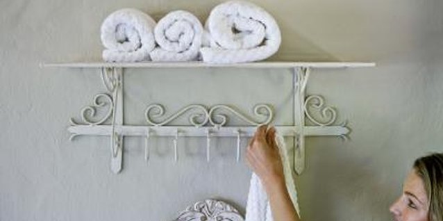 Jupiterimages/BananaStock/Getty Images Wall hooks serve a dual purpose as functional and decorative decor.