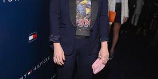 Mark Davis/Getty Images Entertainment/Getty Images Drew Barrymore pairs a T-shirt with her suit at an event in Los Angeles in February 2013.