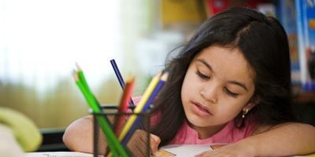 Visage/Stockbyte/Getty Images A set time for homework and other tasks is essential to student success.