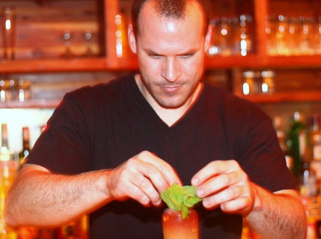 Jason Littrell prepares the Behind God’s Back cocktail