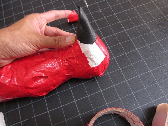 Add a head and beak.