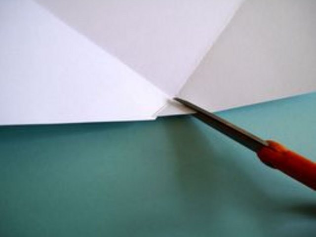 Cut the triangle area out of the paper.