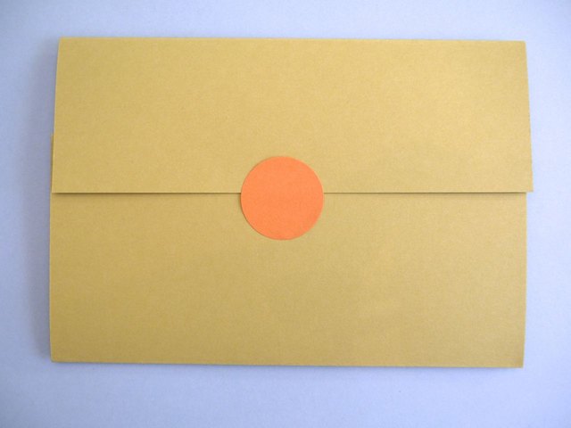 Fold and seal with a sticker or glue.