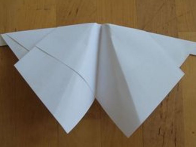 A moth-inspired paper airplane A moth-inspired paper airplane