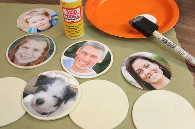 Decoupage photos onto wood discs