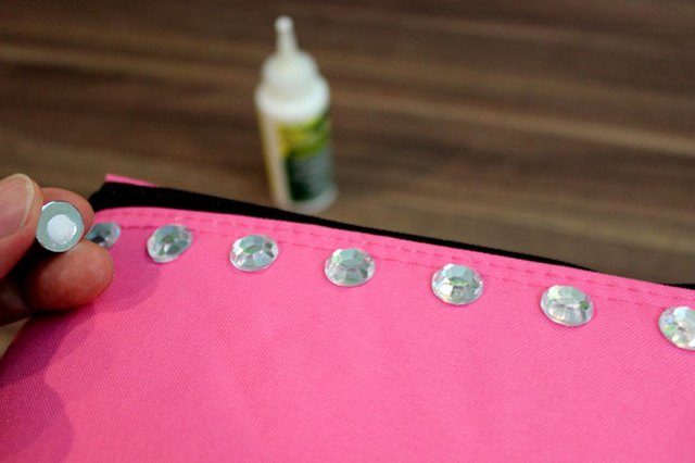 Glue rhinestones to the border