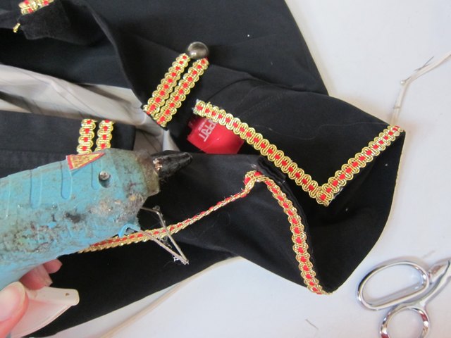 Add trim to collar.