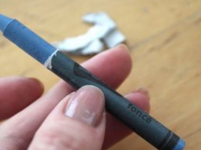 Peeling the crayon.