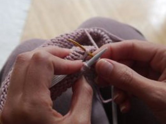 Insert yarn needle through cast-on edge