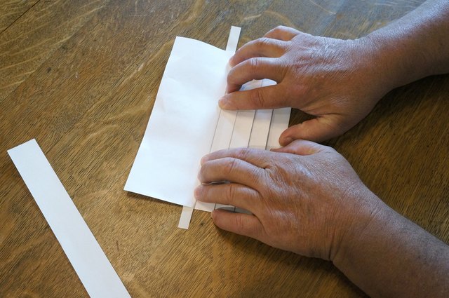 Alternate folds creating pleats.