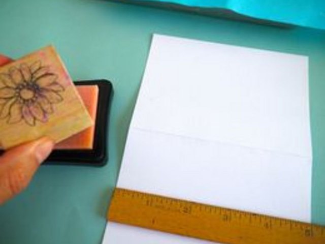 Apply the stamp to the embossing ink.